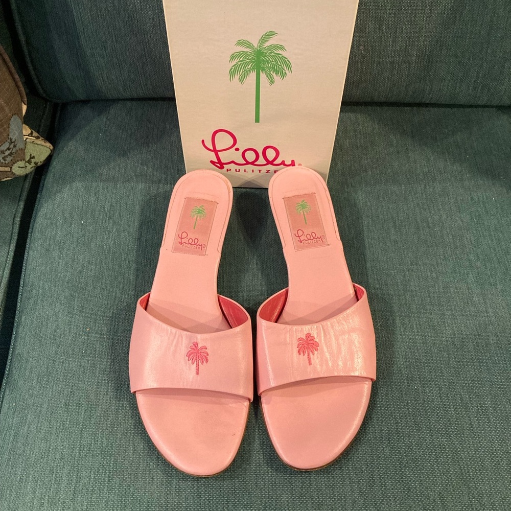 Lilly Pulitzer pink kitten heel slides.